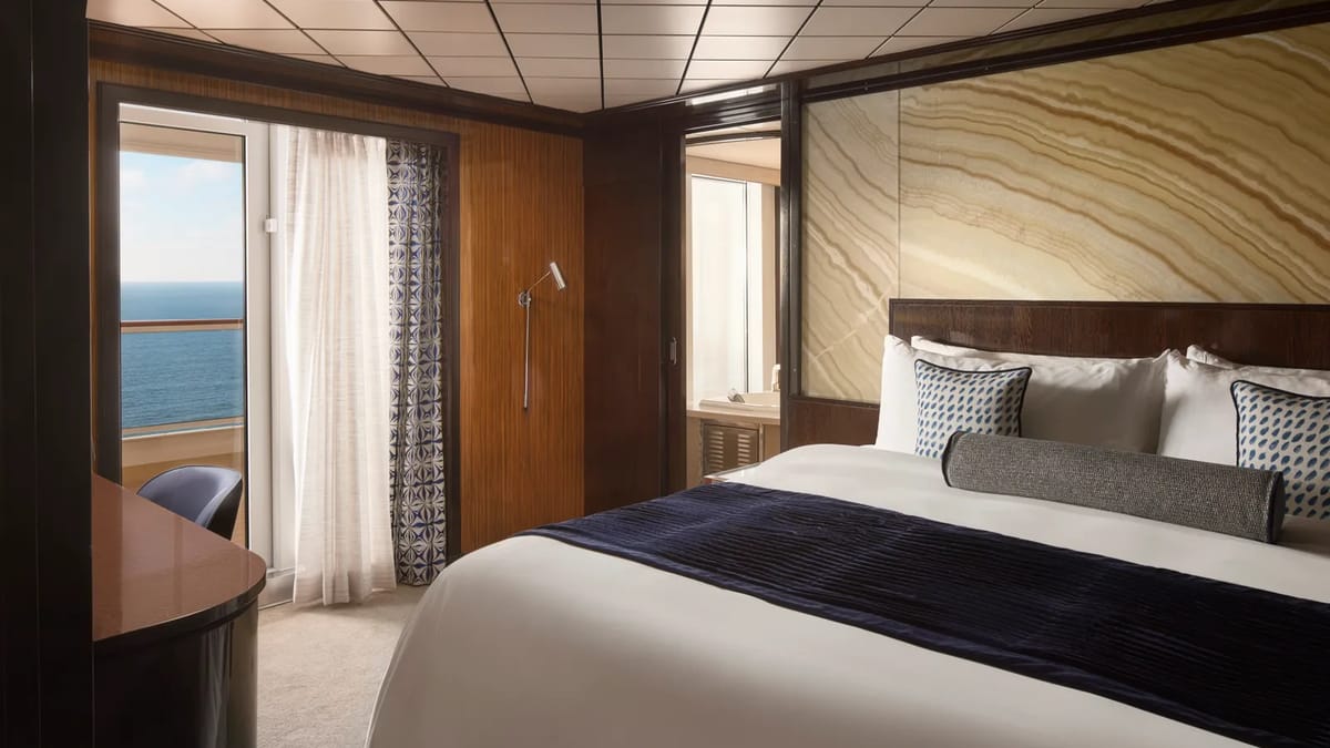 Pride of America - Deluxe Owner's Suite with Large Balcony Master Bedroom