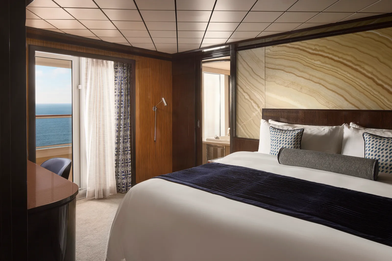 Pride of America - Deluxe Owner's Suite with Large Balcony Master Bedroom